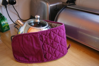 Dada-esque Kettle, with gloves